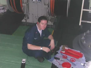 Safe Place: A female Sailor working inside a ship
