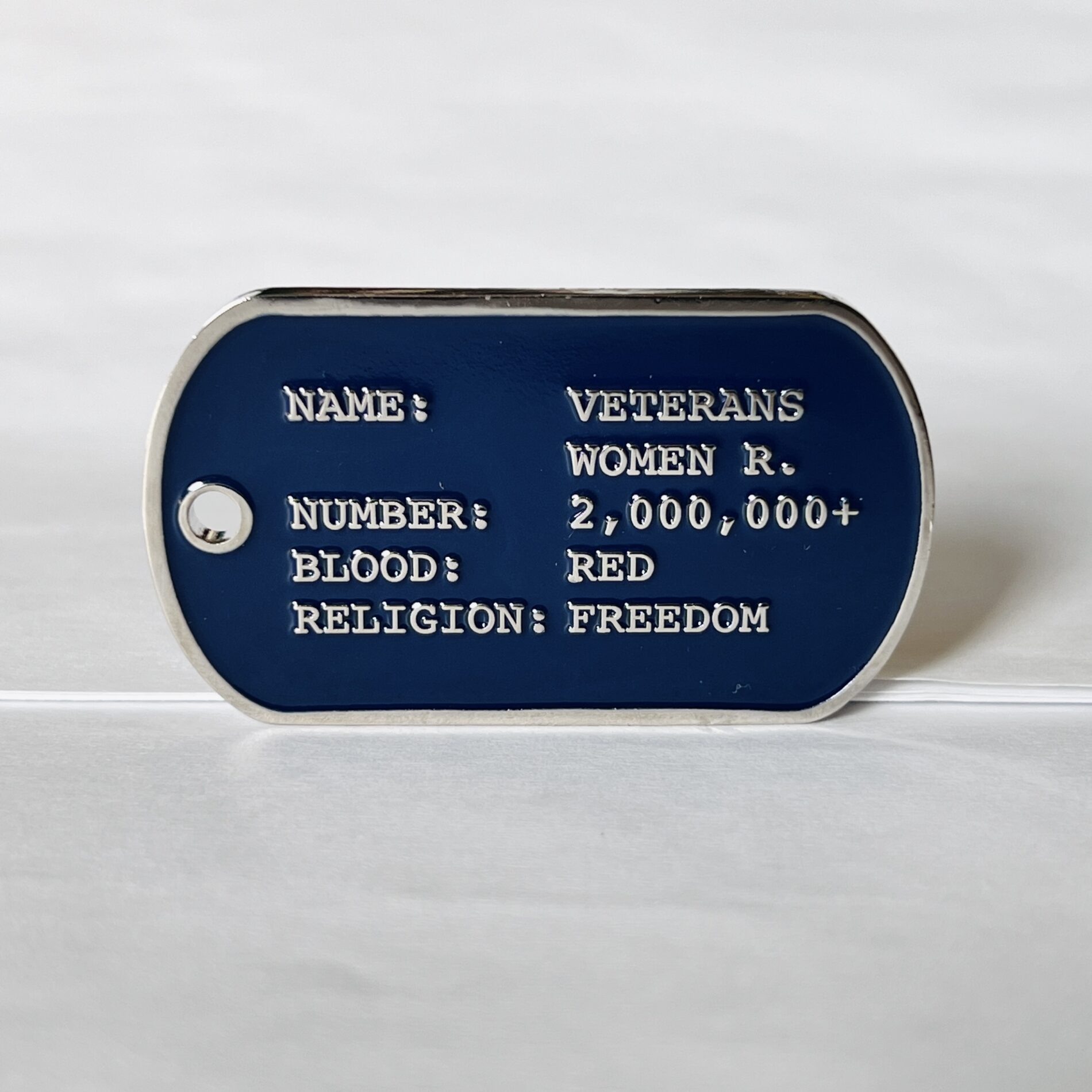 Back of a Lady Vet dog tag challenge coin